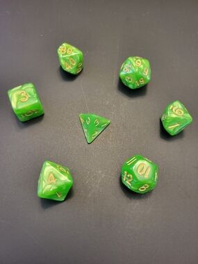 Marbled Green RPG Polyhedral Dice Set with Gold Numbers